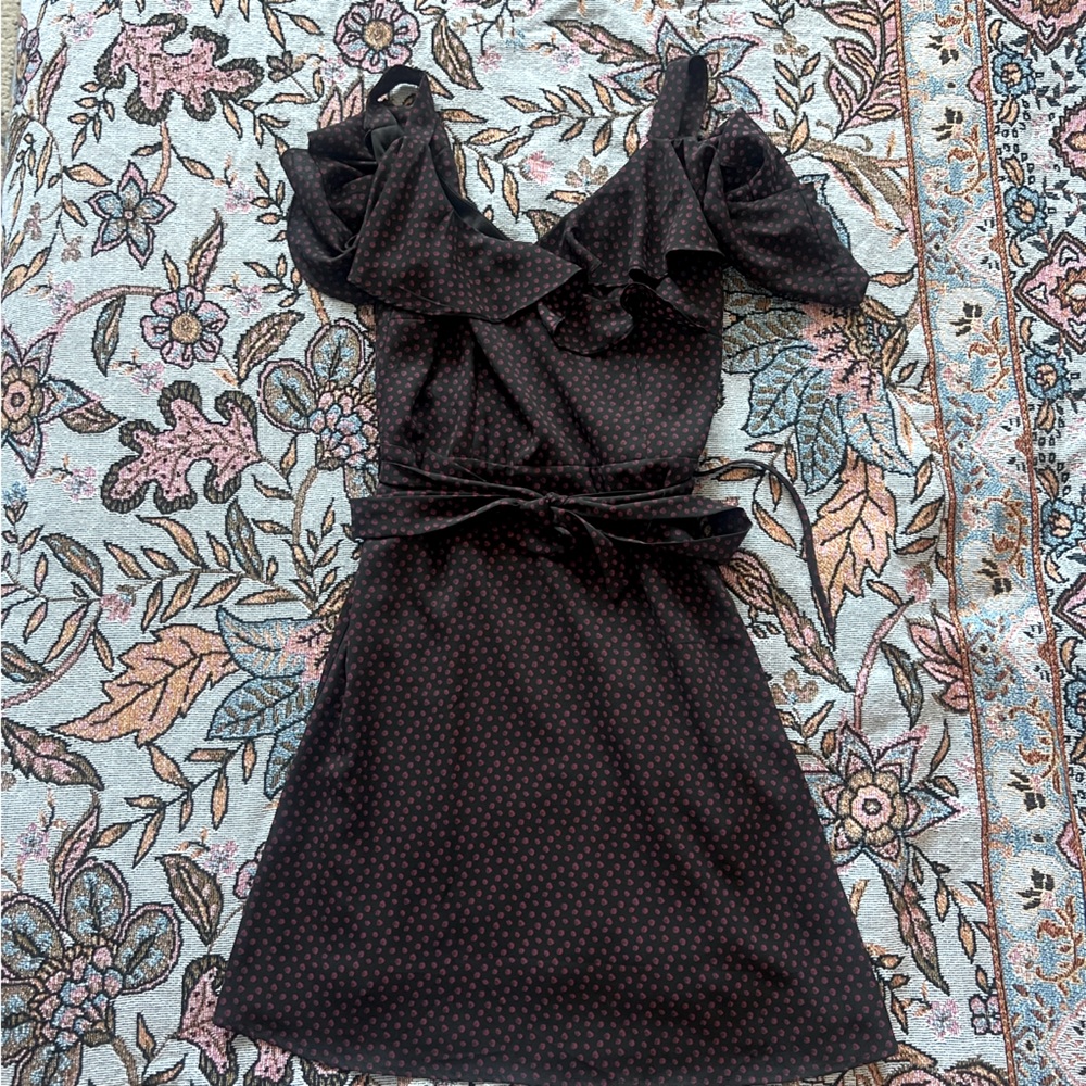 Black dress with small pink dots.